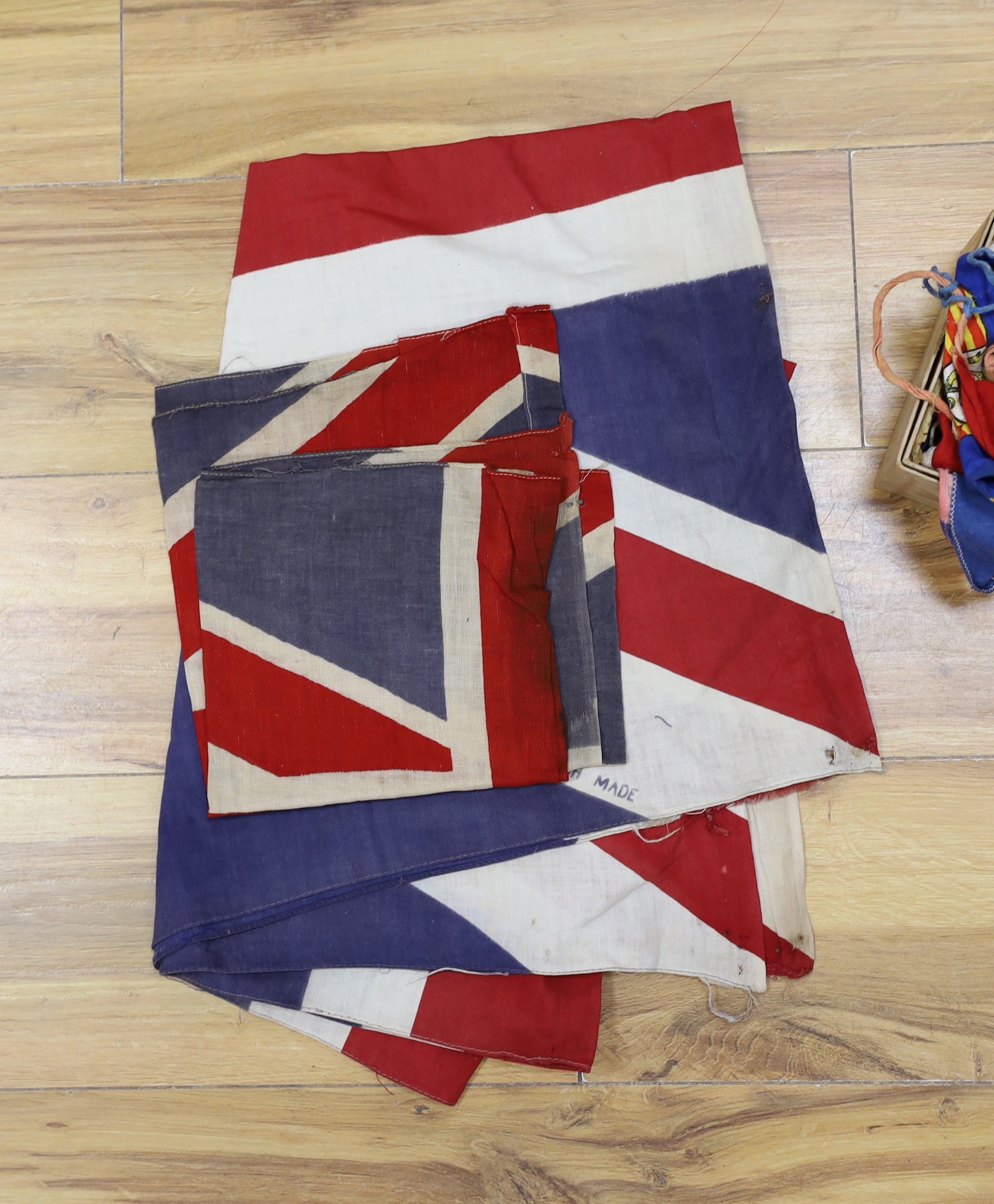 A mixed collection of flags and bunting to include the Union Jack and the star spangled banner